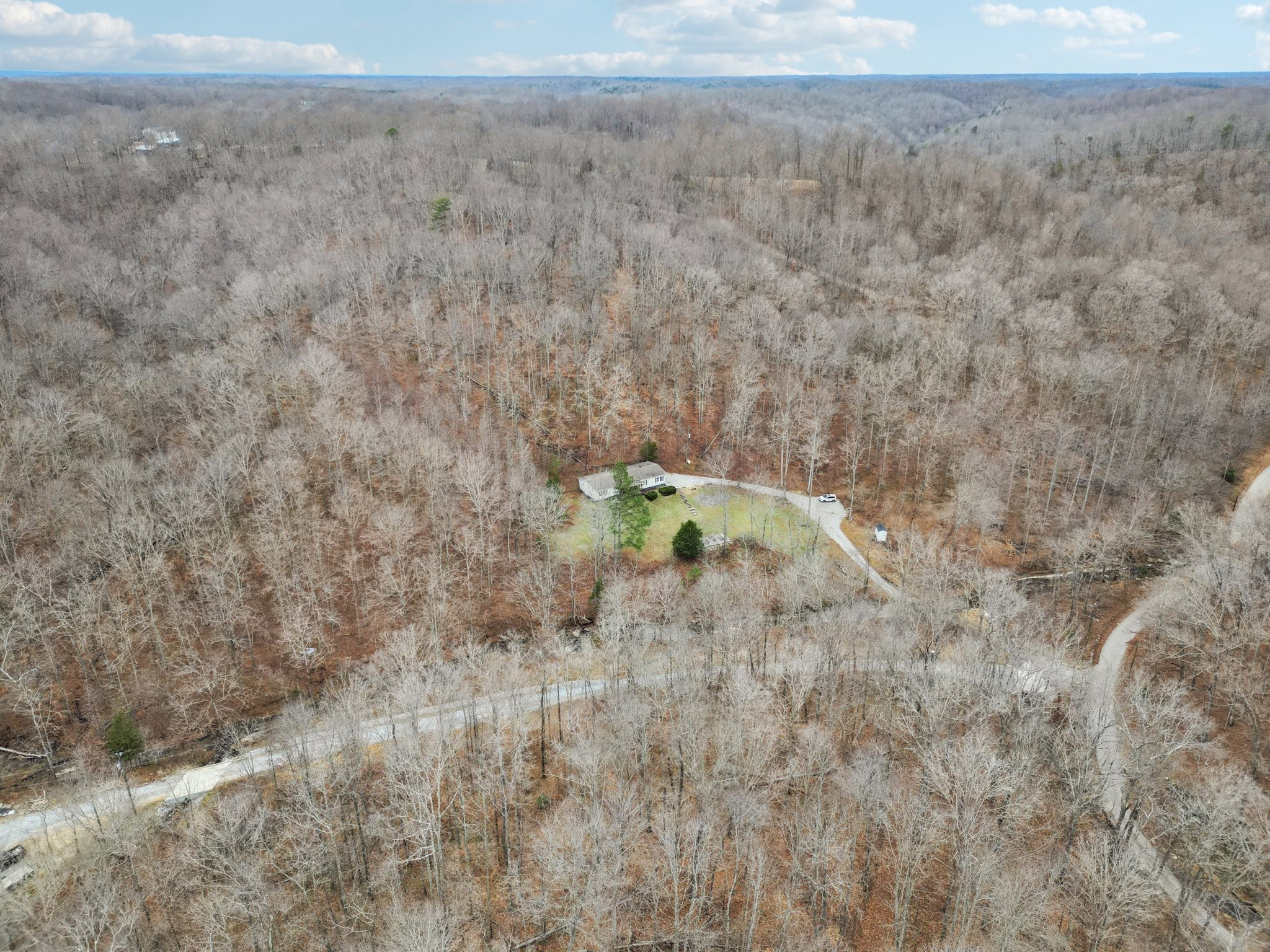3668 Old Sams Creek Road Pegram, TN 37143 - Photo 57 of 60 a backyard of a house
