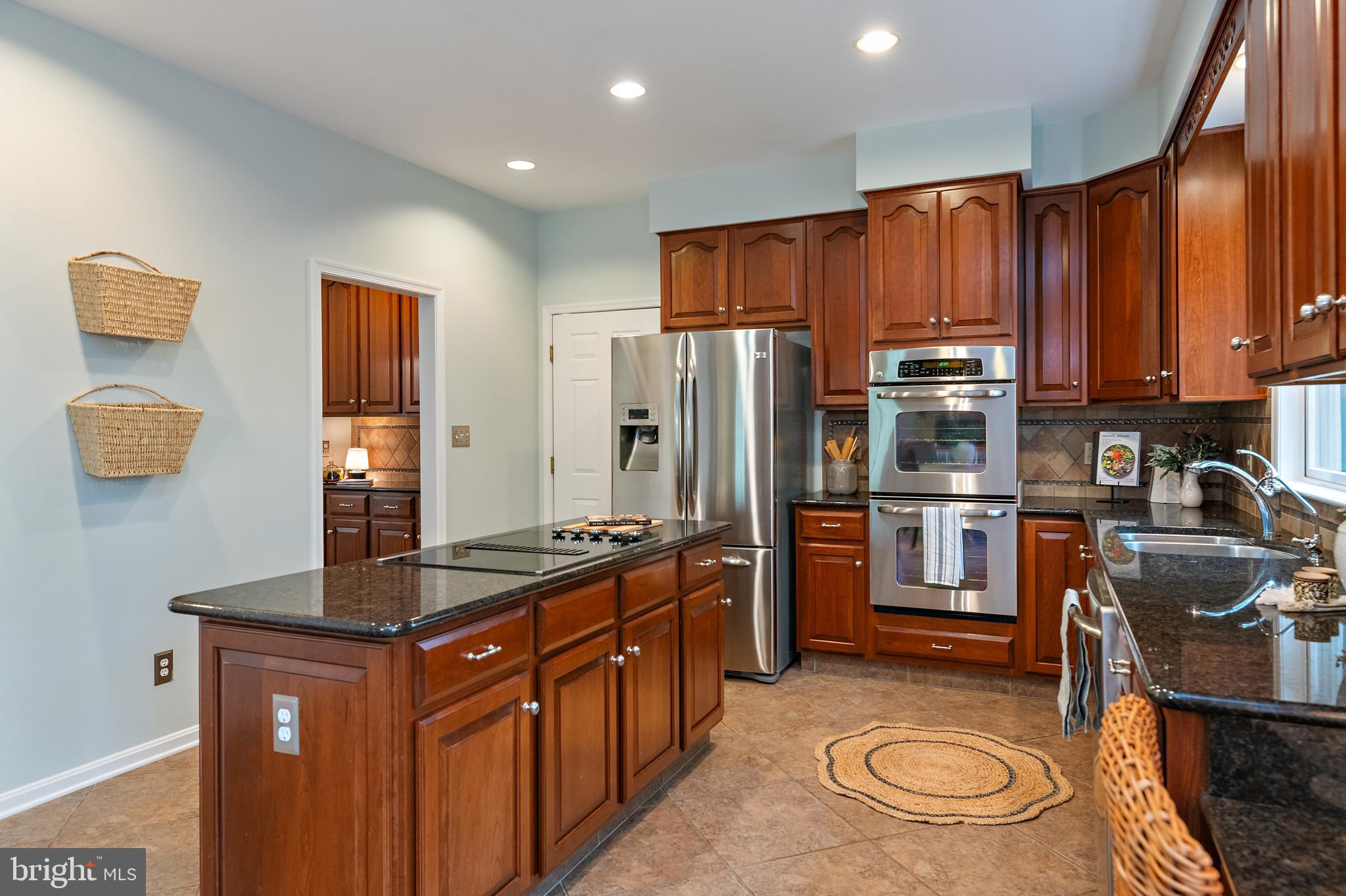 150 South River Landing Road Edgewater, MD 21037 - Photo 14 of 50 a kitchen with stainless steel appliances granite countertop a refrigerator a stove top oven a sink and dishwasher