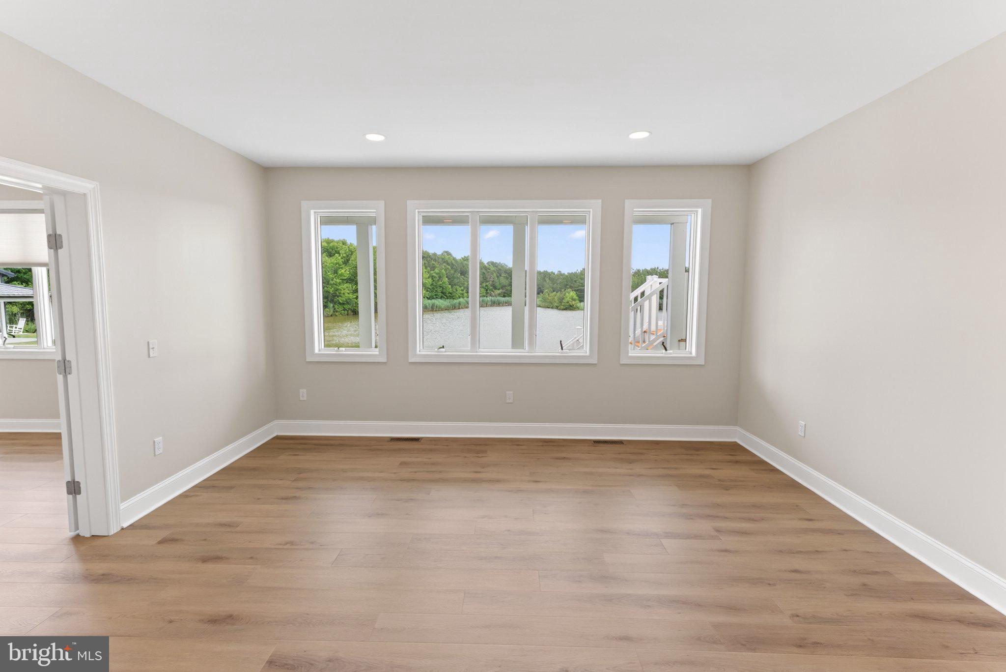 34029 Peppers Corner Road Millville, DE 19967 - Photo 33 of 101 Bright, airy space with scenic views.