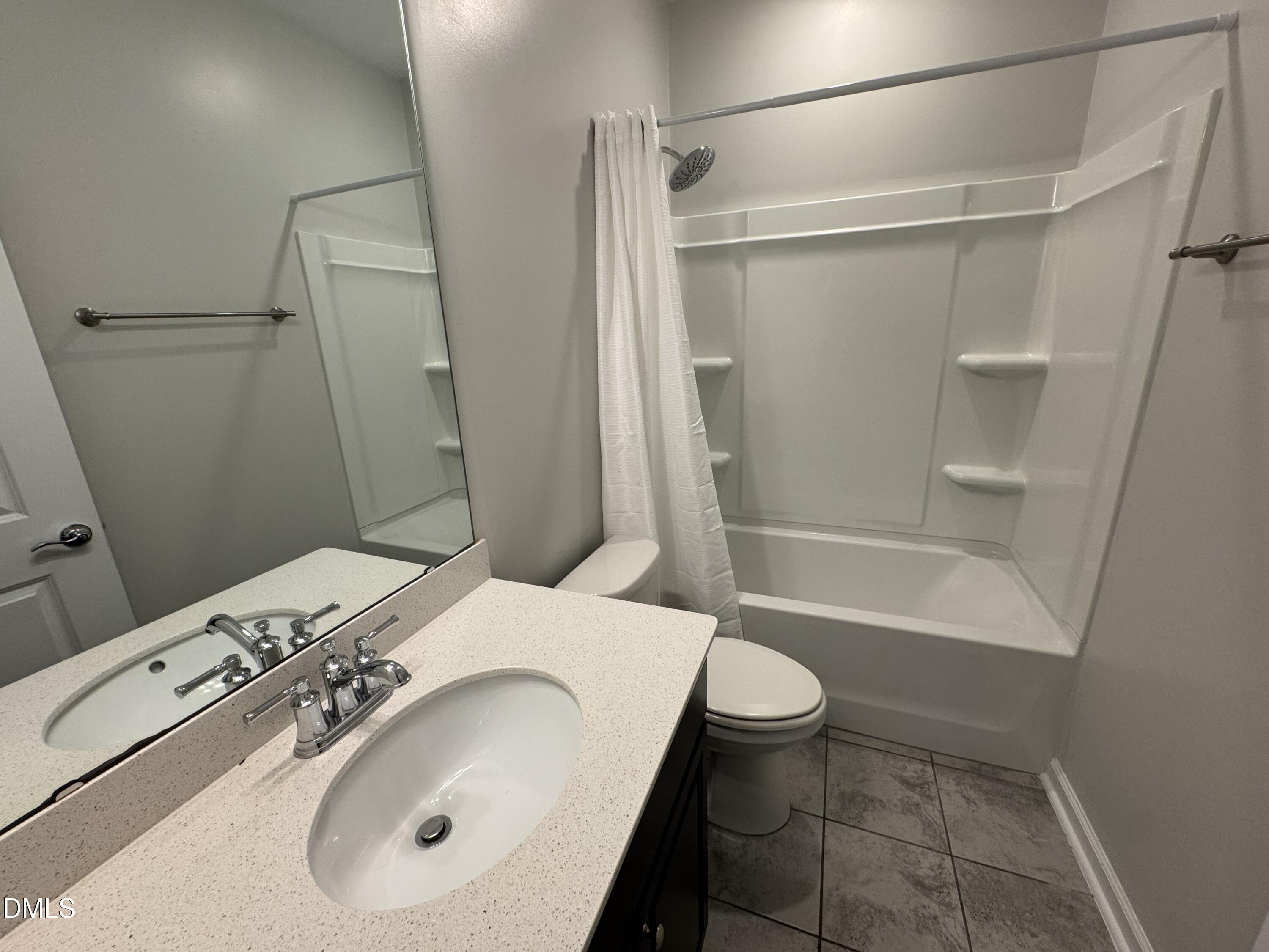 2022 Attend Crossing Fuquay-Varina, NC 27526 - Photo 19 of 43 a bathroom with a sink a toilet and shower