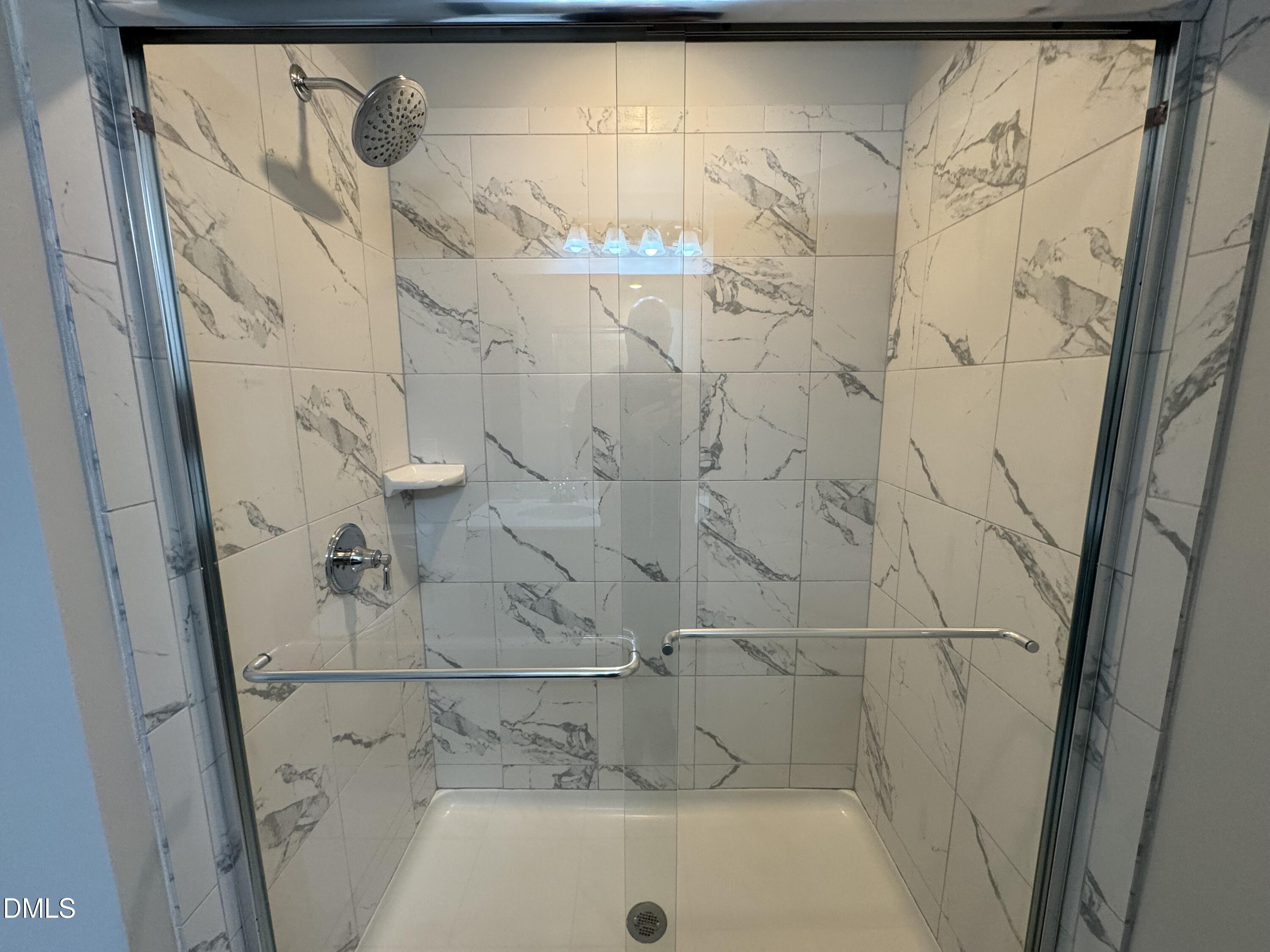 2022 Attend Crossing Fuquay-Varina, NC 27526 - Photo 24 of 43 a bathroom with a bathtub