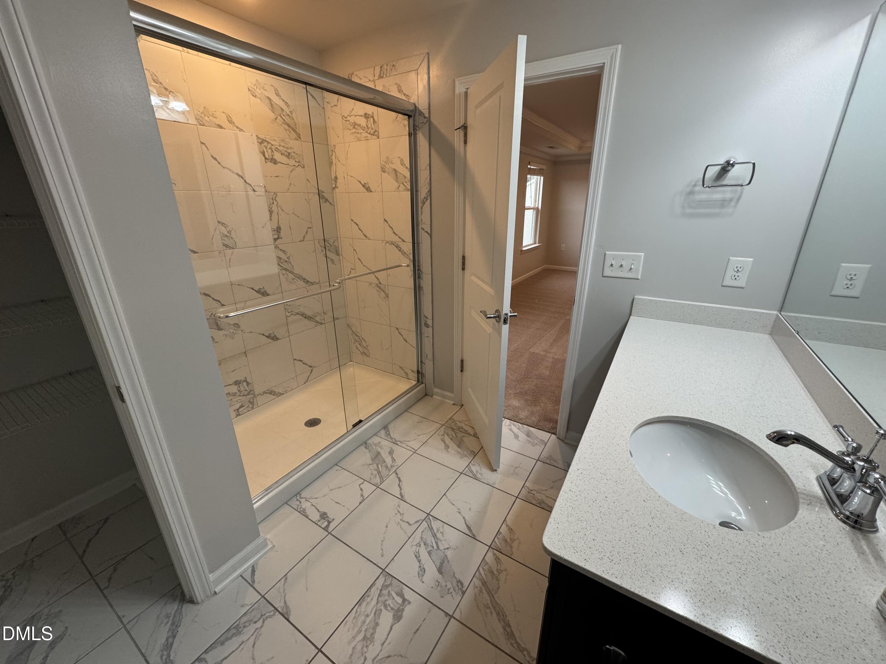 2022 Attend Crossing Fuquay-Varina, NC 27526 - Photo 25 of 43 a bathroom with a sink and shower