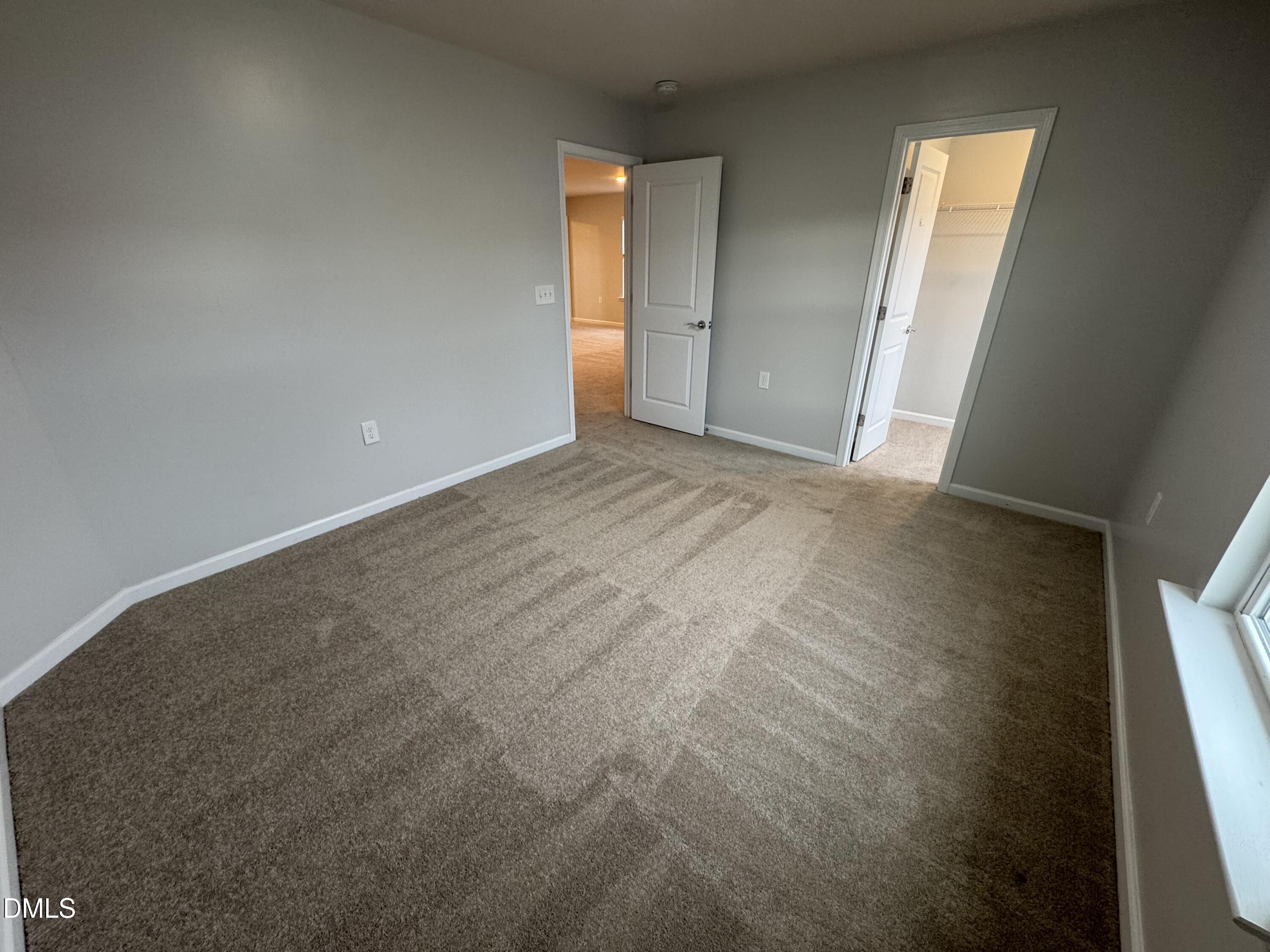 2022 Attend Crossing Fuquay-Varina, NC 27526 - Photo 31 of 43 a view of an empty room with a window
