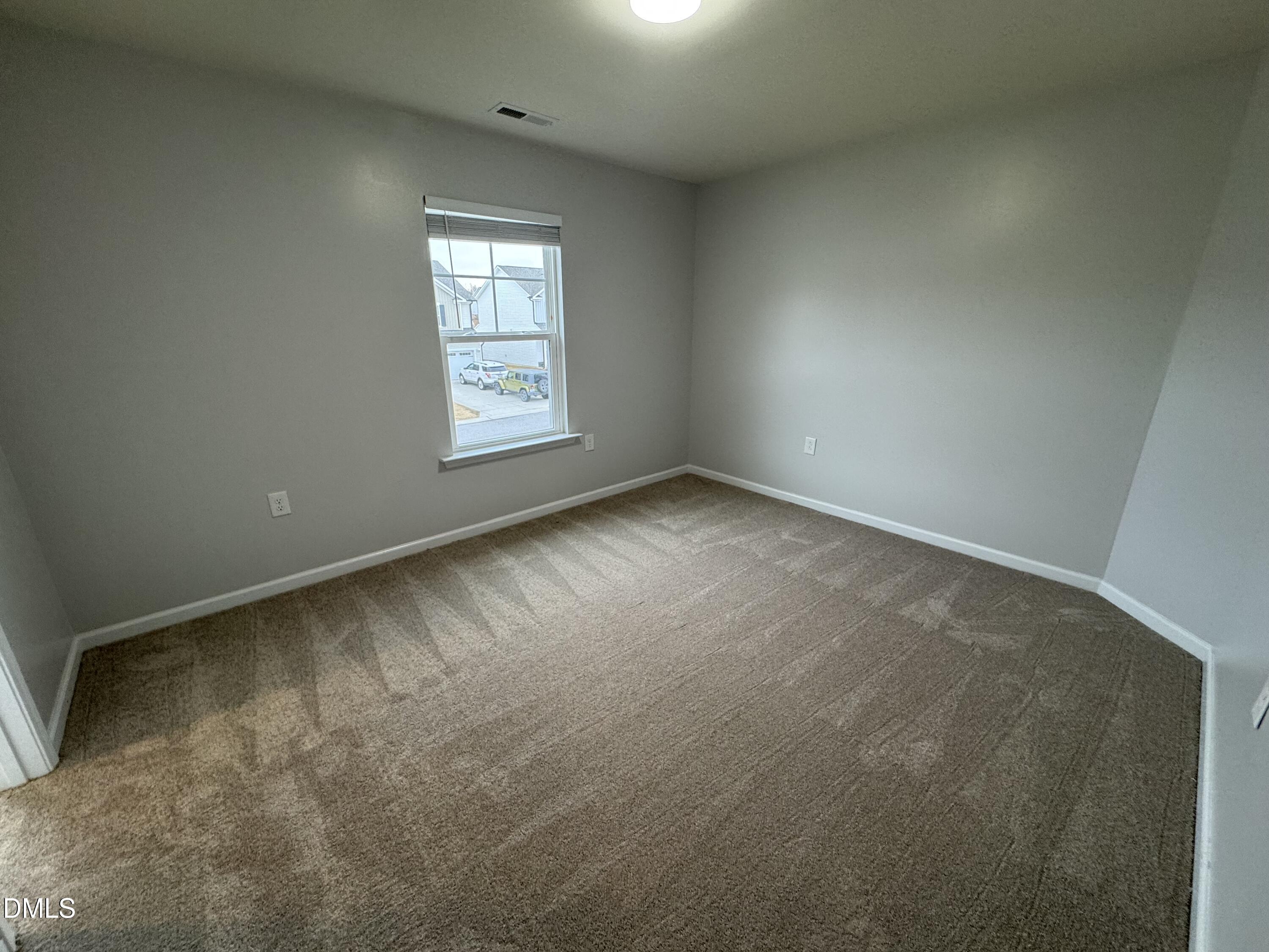 2022 Attend Crossing Fuquay-Varina, NC 27526 - Photo 33 of 43 an empty room with a window
