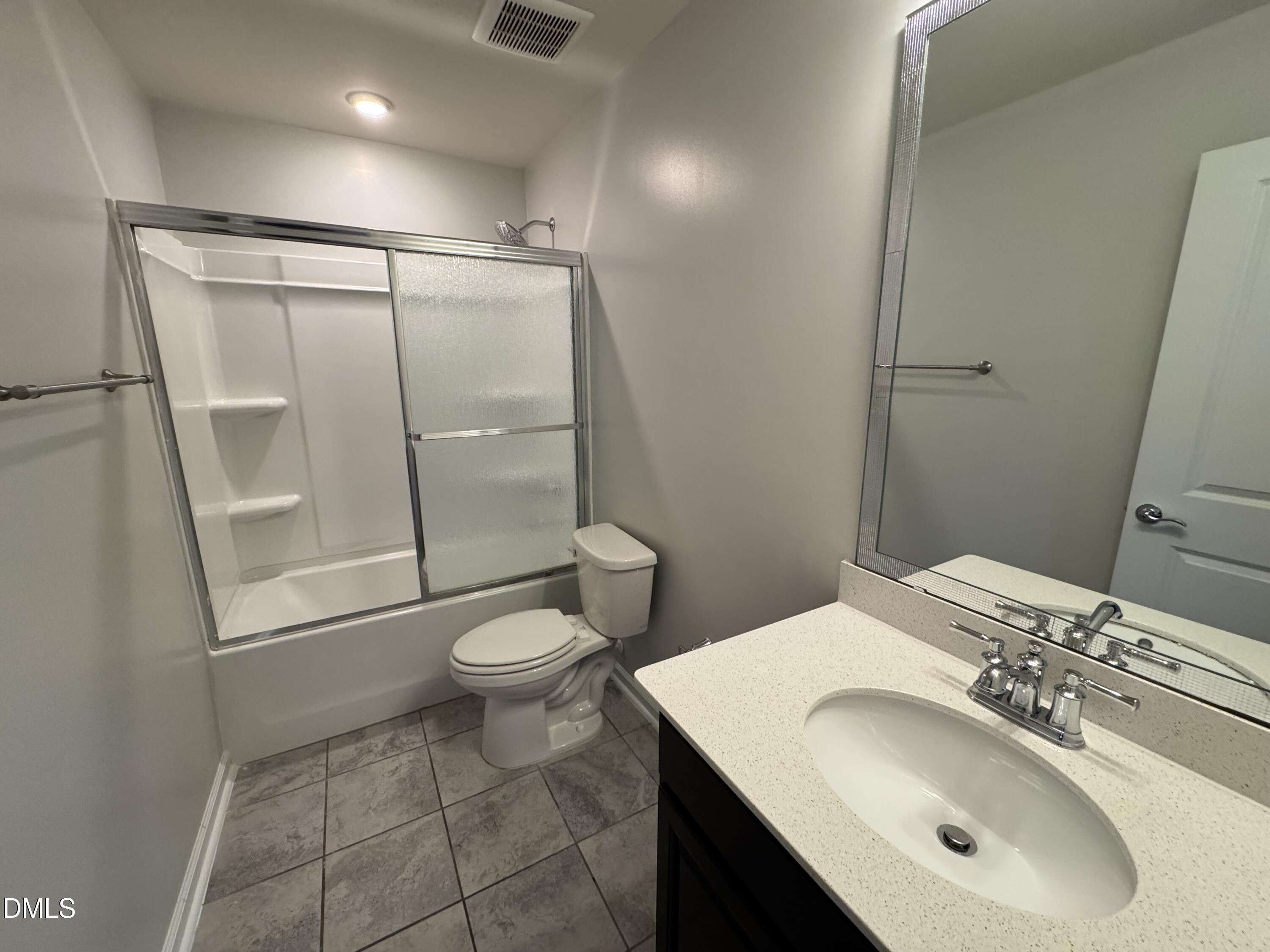 2022 Attend Crossing Fuquay-Varina, NC 27526 - Photo 34 of 43 a bathroom with a sink toilet and shower