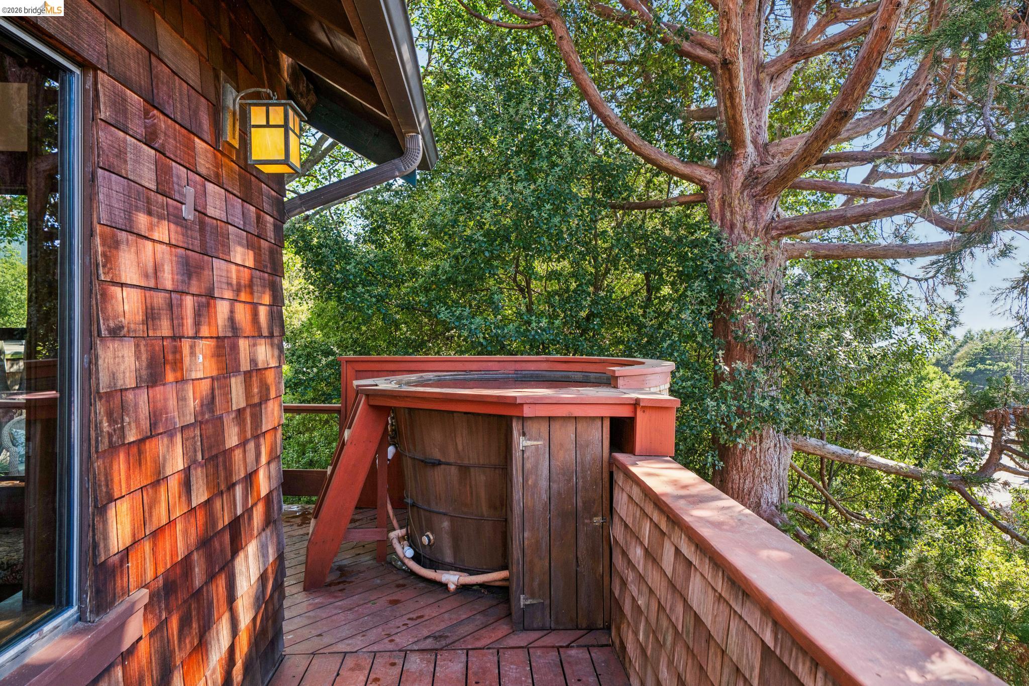 813 San Diego Road Berkeley, CA 94707 - Photo 8 of 60 a view of balcony with wooden floor and fence