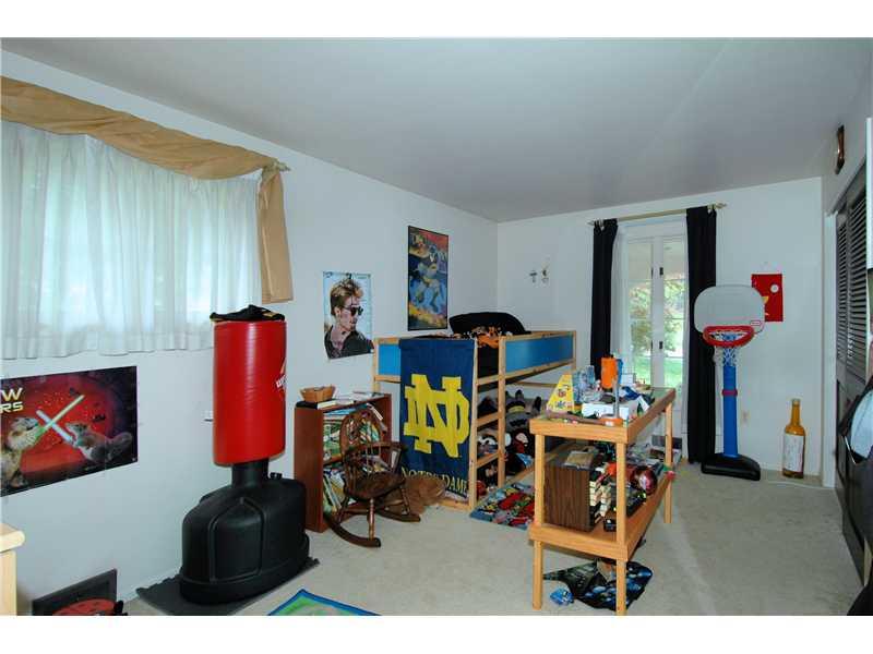 324 McIntyre Road Pittsburgh, PA 15237 - Photo 15 of 25 Bedroom. Another bright bedroom featuring beautiful windows.