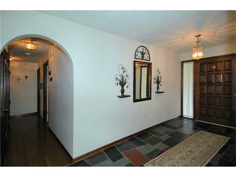 324 McIntyre Road Pittsburgh, PA 15237 - Photo 5 of 25 Entry/Foyer. Another beautiful view of the wide and welcoming foyer, slate flooring, and gorgeous hardwoods.