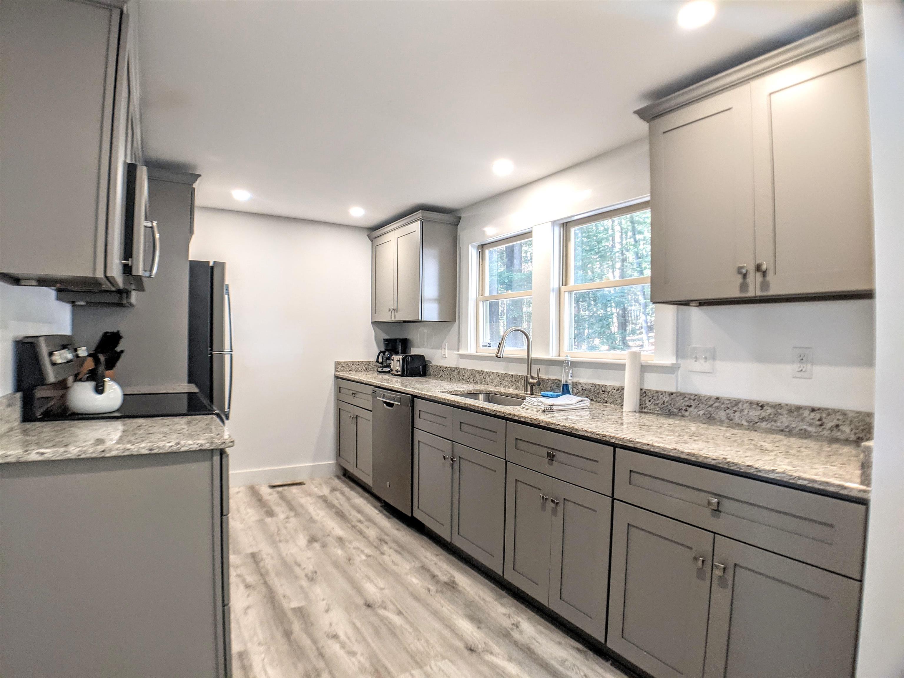 65 Dockham Shore Road Gilford, NH 03249 - Photo 4 of 21 Gallery Image 4