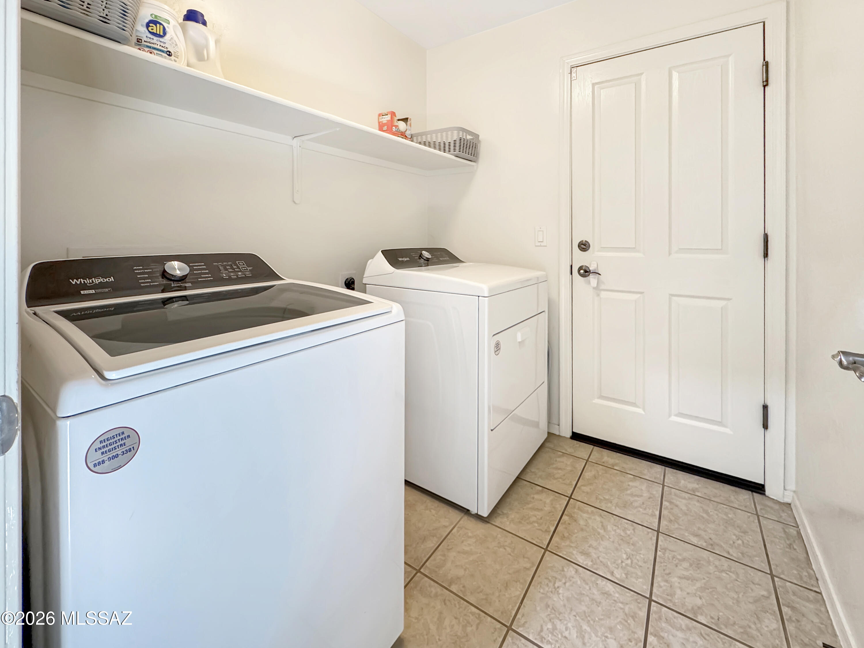 10835 South Heart Break Ridge Place Vail, AZ 85641 - Photo 33 of 49 a utility room with dryer and washer