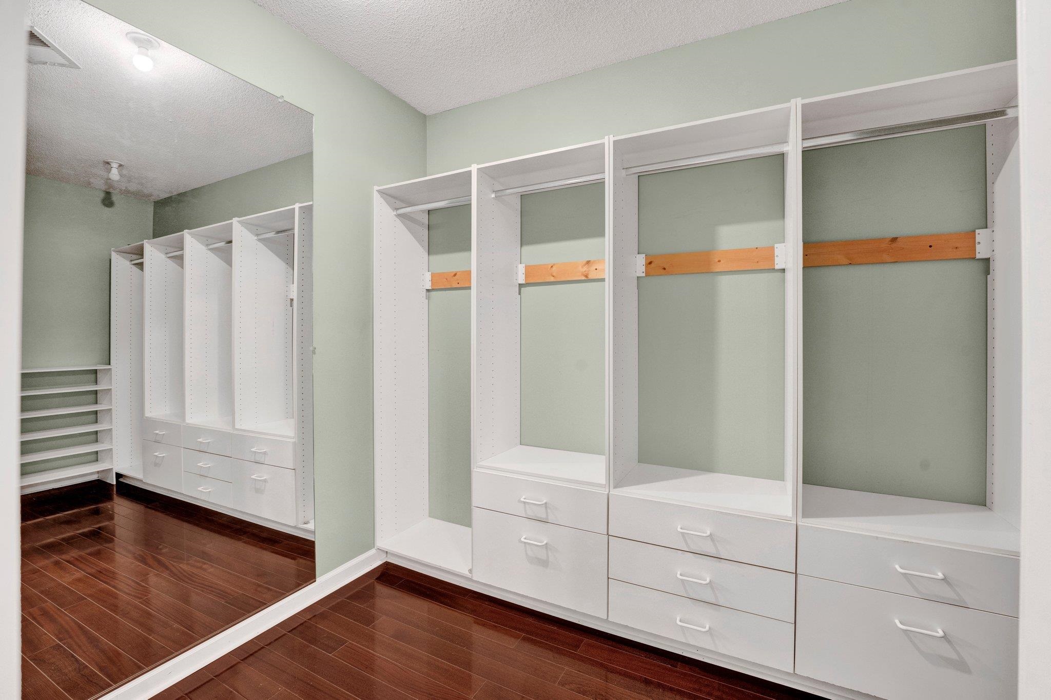 6150 Ricks Road Arlington, TN 38002 - Photo 35 of 40 Walk in closet with dark wood-type flooring