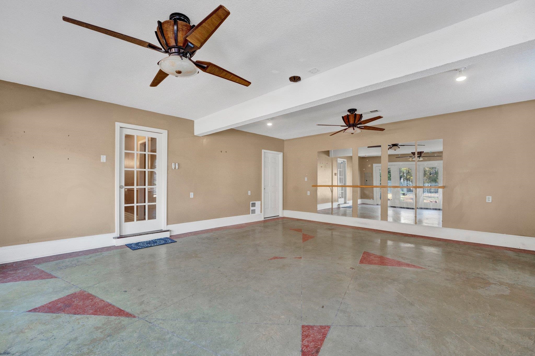 6150 Ricks Road Arlington, TN 38002 - Photo 40 of 40 Empty room featuring beam ceiling and a textured ceiling