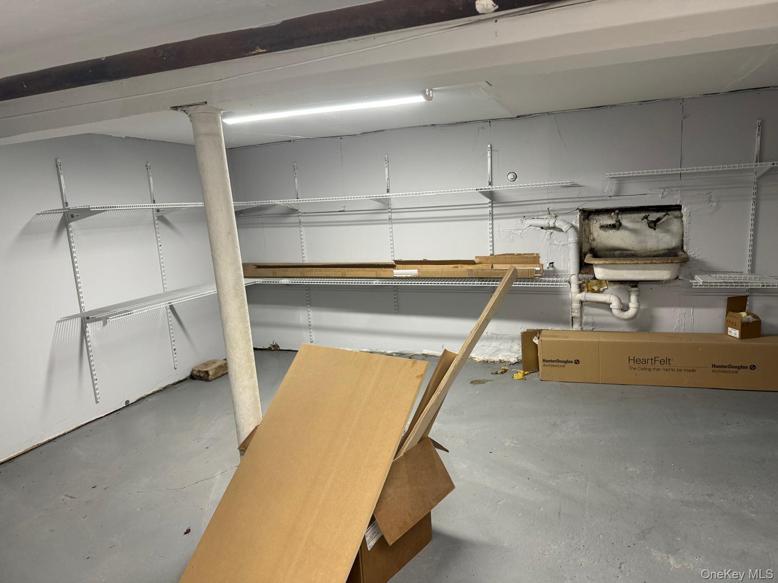 45-16 National Street Queens, NY 11368 - Photo 11 of 28 a storage room with washing machine