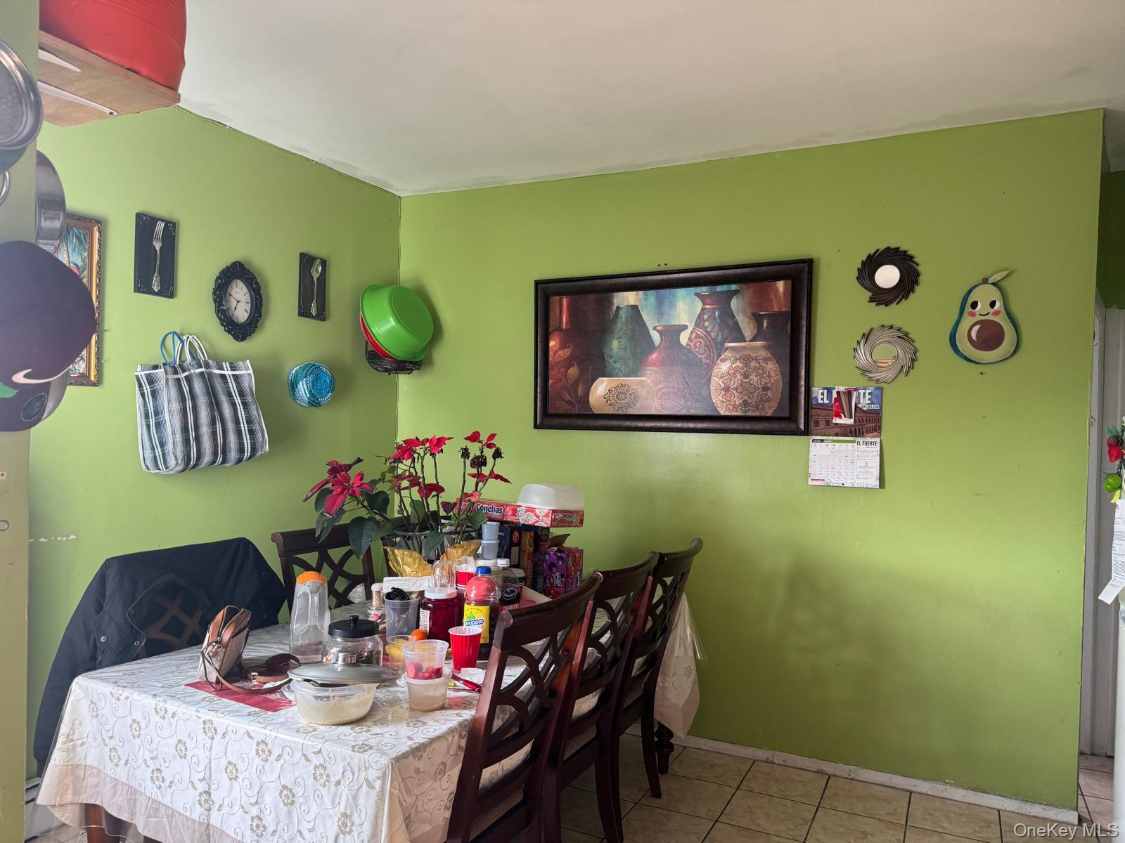 45-16 National Street Queens, NY 11368 - Photo 19 of 28 a view of a dining room with furniture