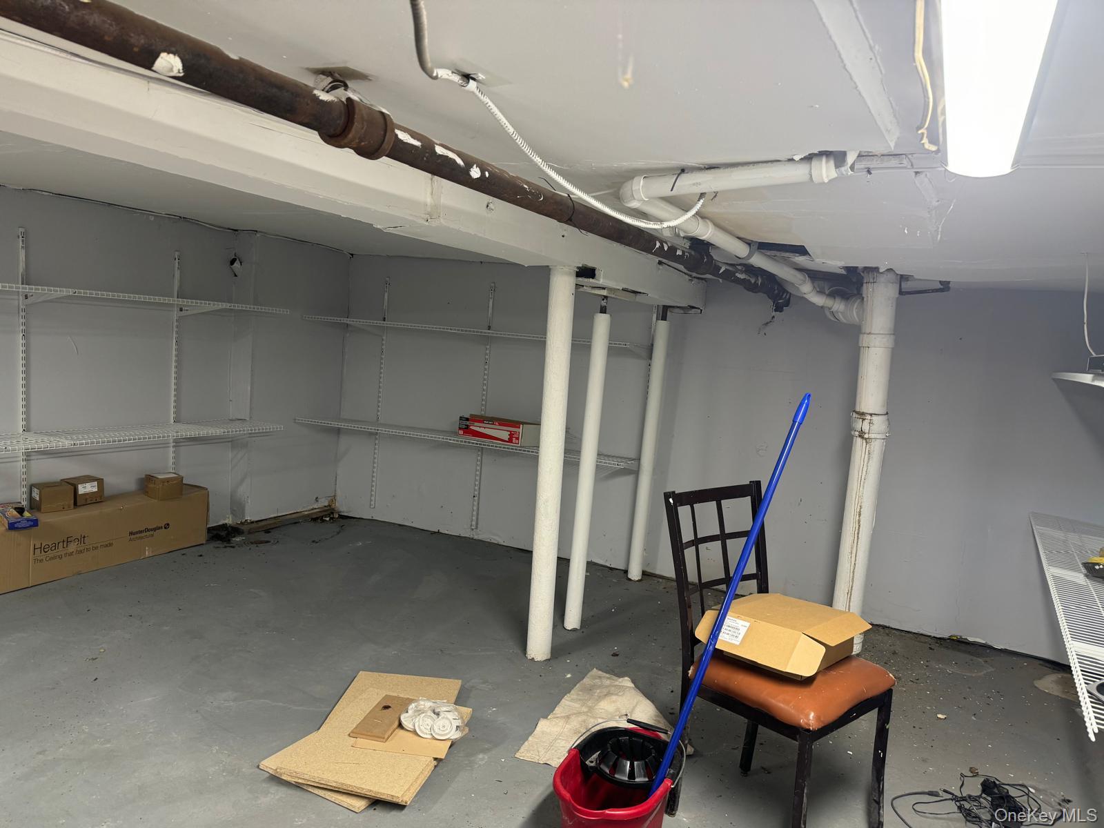 45-16 National Street Queens, NY 11368 - Photo 9 of 28 a room with furniture and a window