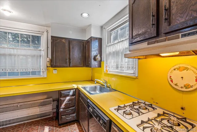 a bathroom with a sink a bath tub and a shower