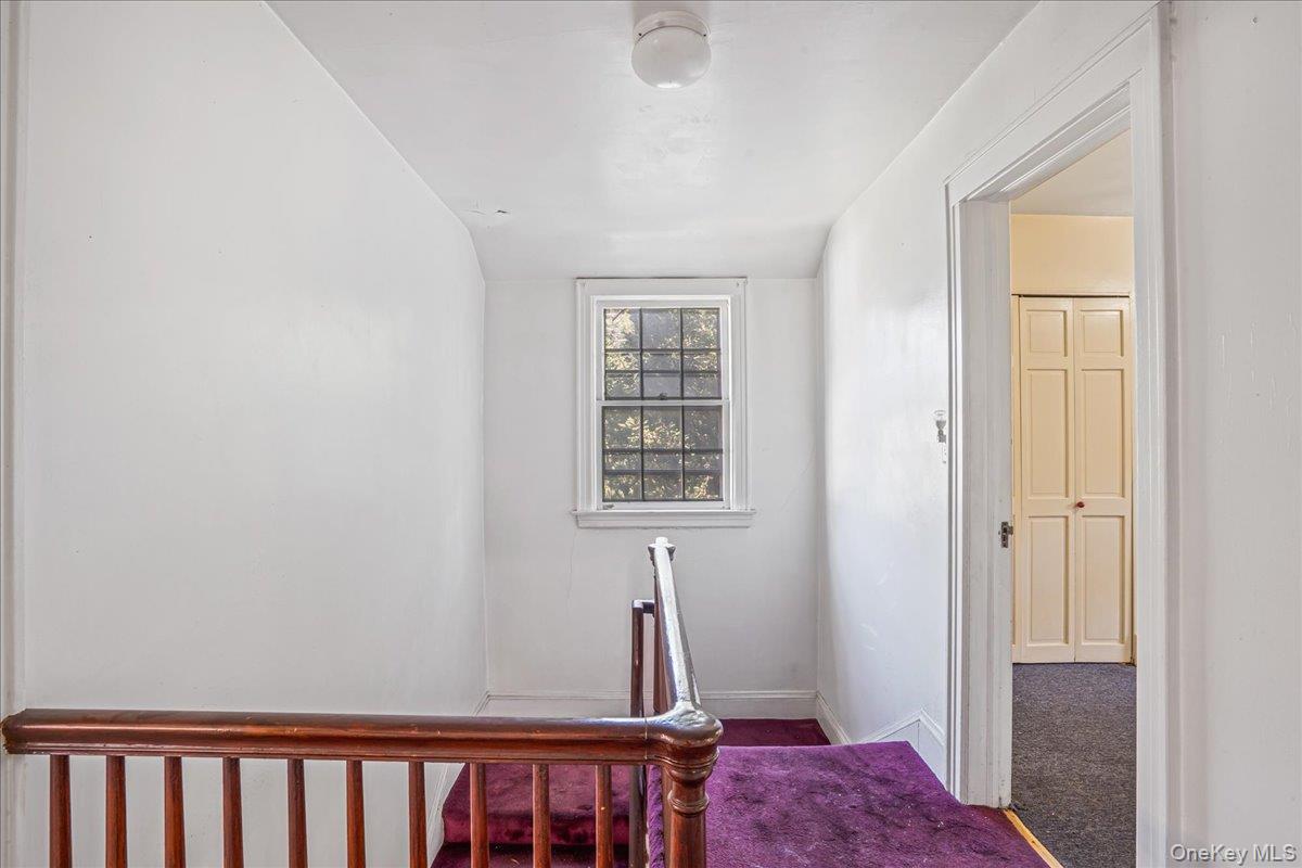 180-19 Grand Central Parkway Queens, NY 11432 - Photo 18 of 28 a view of a hallway with front door