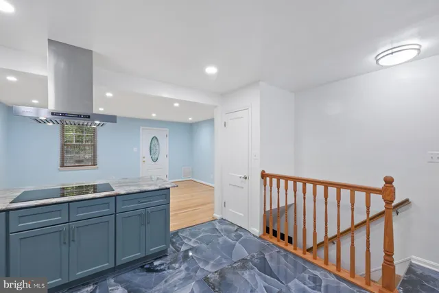 a bathroom with a sink a mirror and a toilet