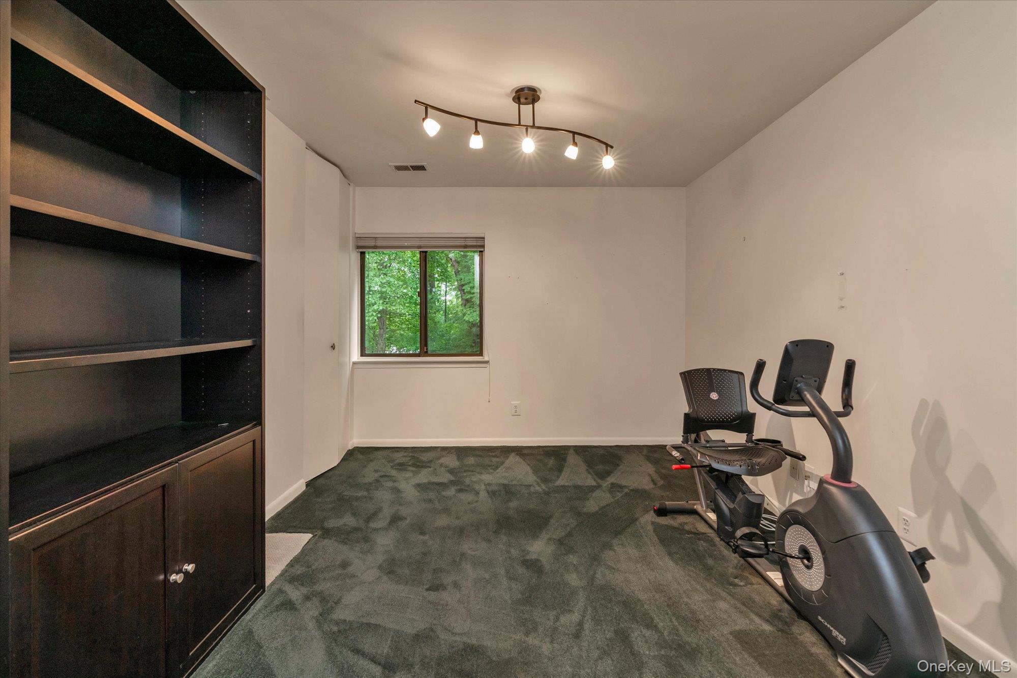 41 Spring Hollow Road Roslyn, NY 11576 - Photo 15 of 27 a view of workspace with wooden floor