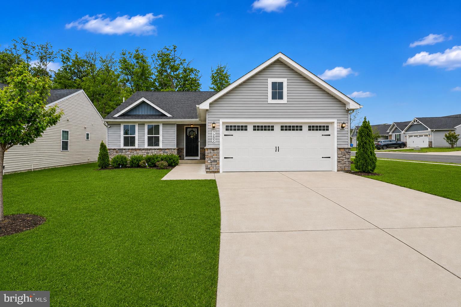 7202 Parchment Circle Ruther Glen, VA 22546 - Photo 1 of 30 a view of a house with a yard