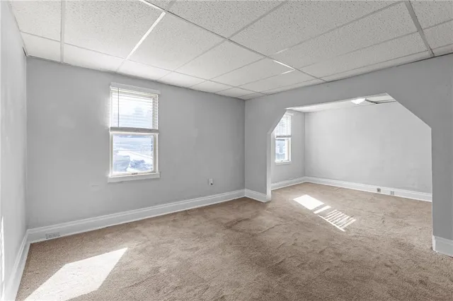 an empty room with windows