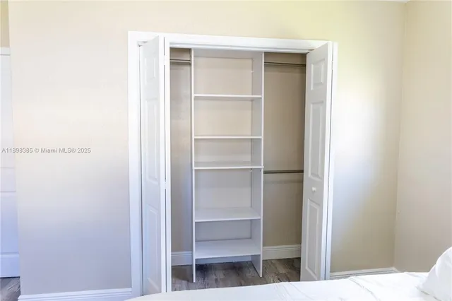 a view of an empty walk in closet