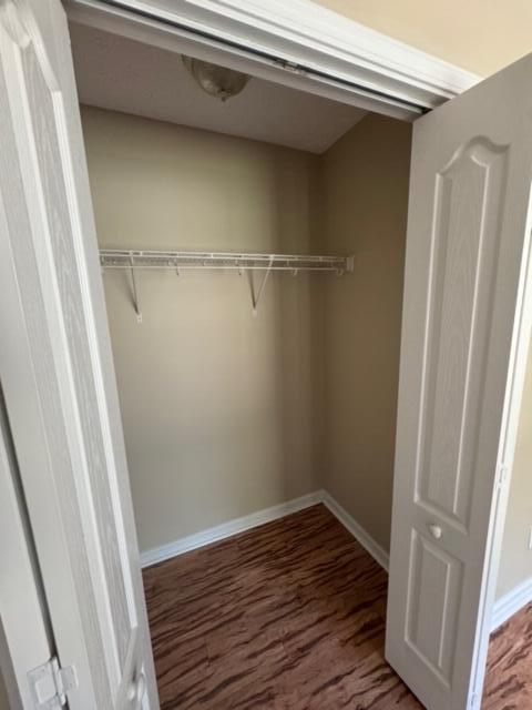 225 Bay Grove Road Freeport, FL 32439 - Photo 6 of 33 a view of a room with wooden floor and staircase