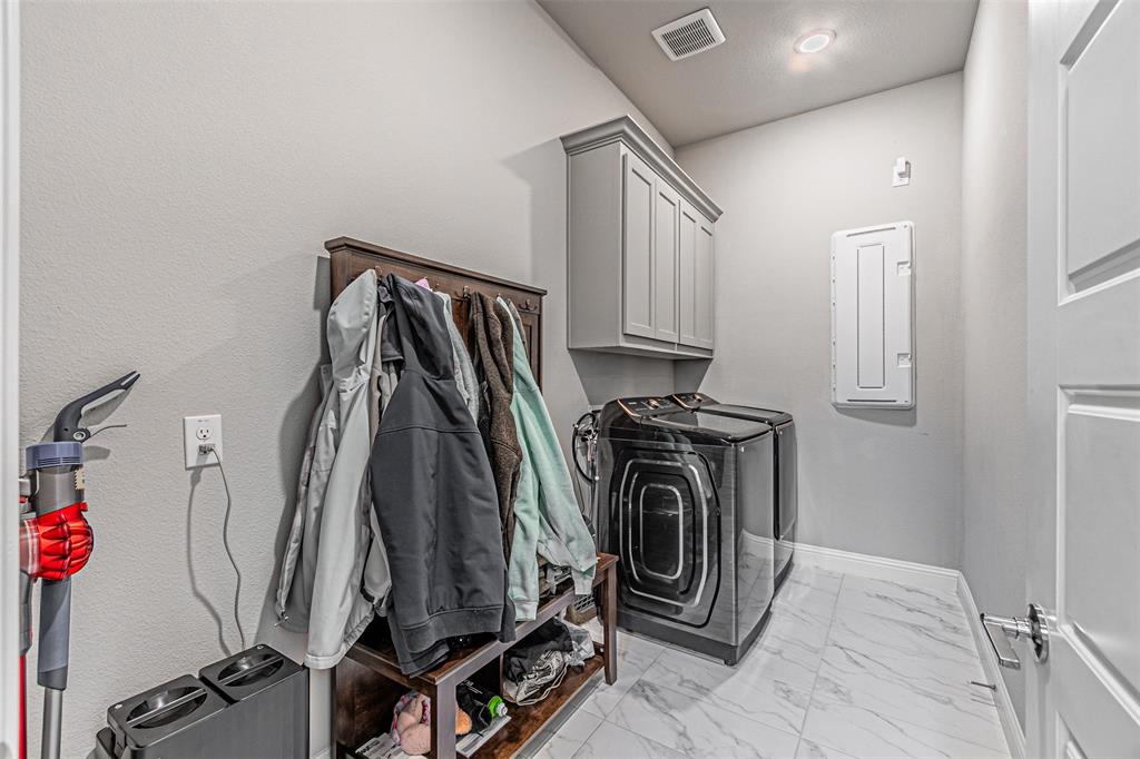 13237 Jonata Street Frisco, TX 75035 - Photo 19 of 40 a view of a storage and utility room with racks on the wall