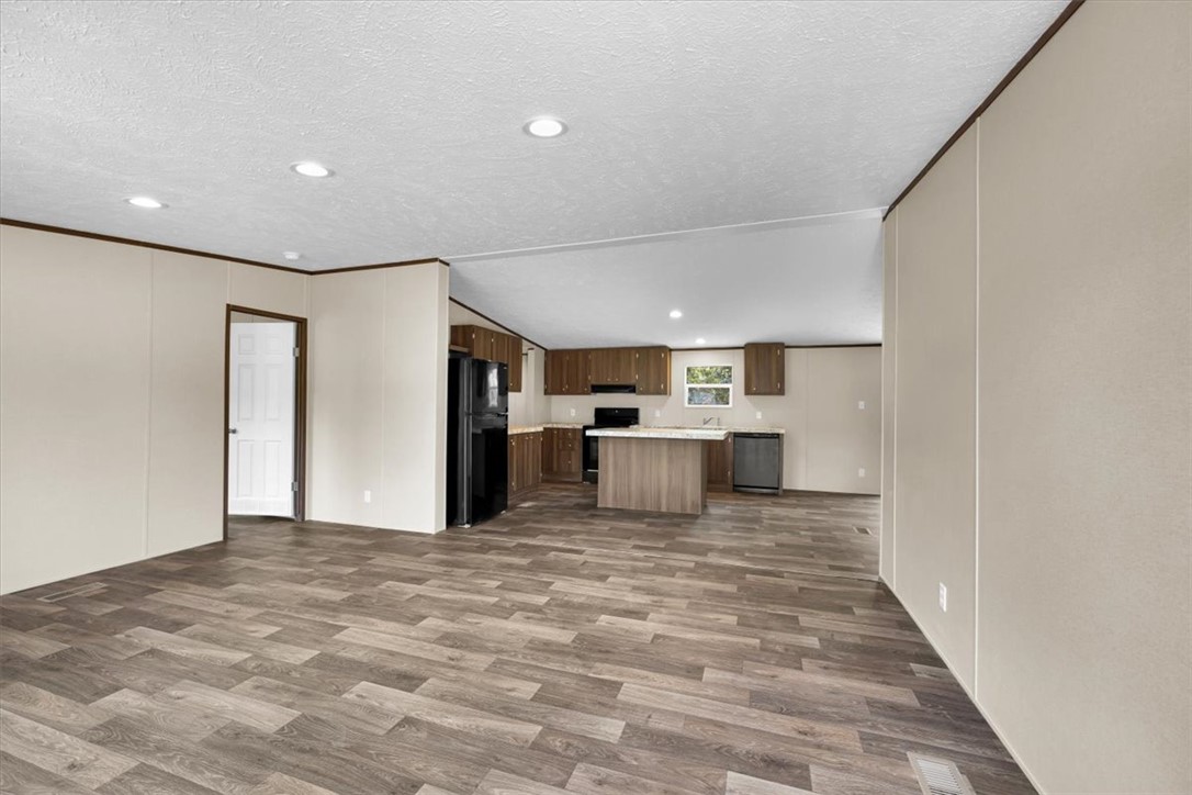 2919 High Shoals Road Anderson, SC 29624 - Photo 3 of 21 This expansive kitchen and living area feature recessed lighting and durable flooring.