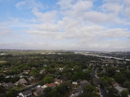 an aerial view of a house with garden