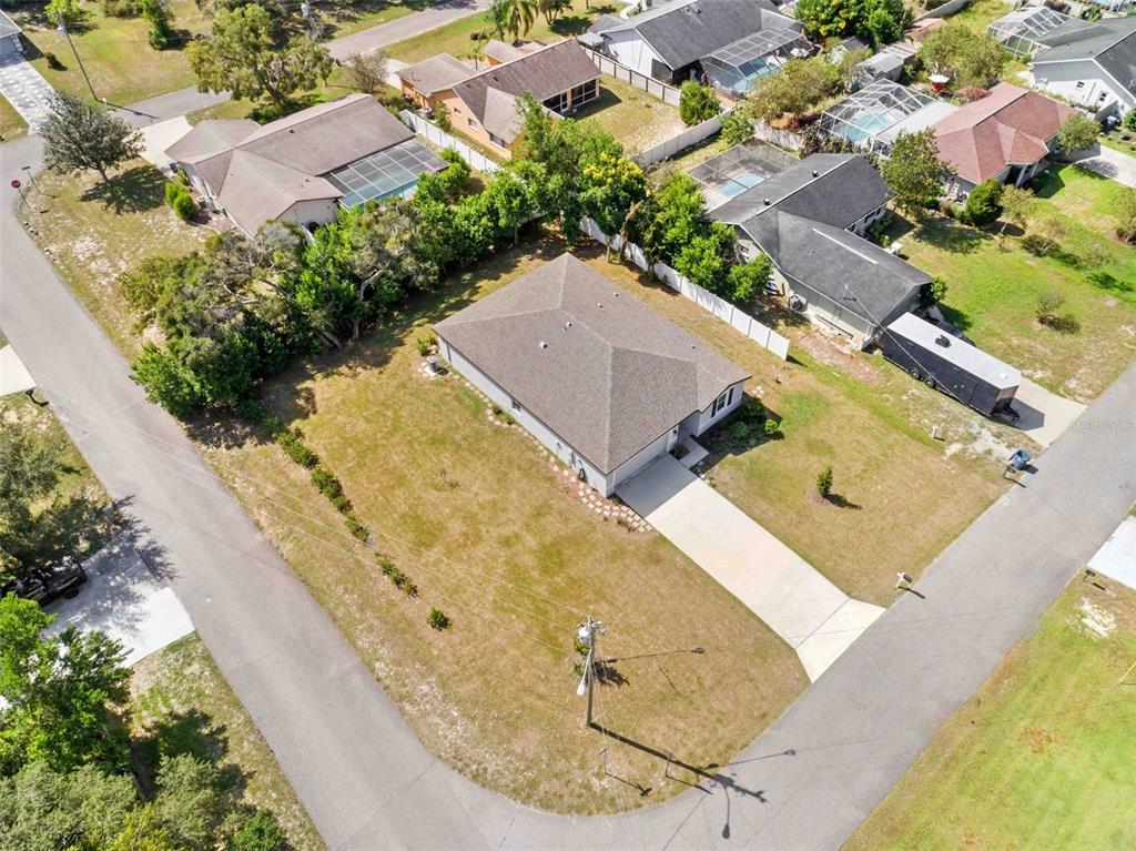 12354 Huron Street Spring Hill, FL 34609 - Photo 19 of 48 an aerial view of a house with a swimming pool