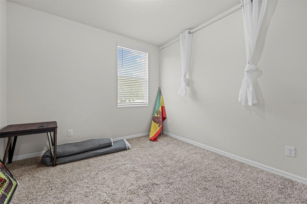 12354 Huron Street Spring Hill, FL 34609 - Photo 31 of 48 a room with a window