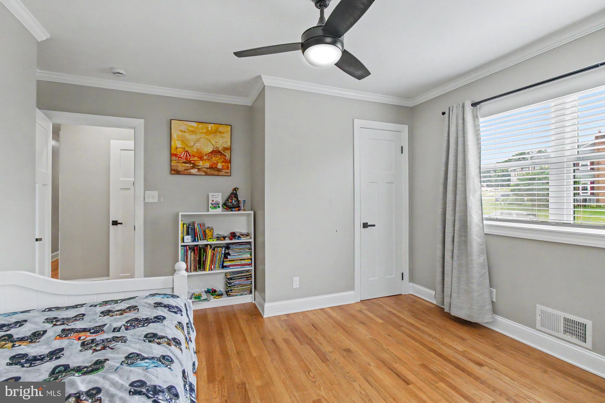 218 Felton Road Lutherville-Timonium, MD 21093 - Photo 31 of 55 Bedroom 4 with ceiling fan and attached book case