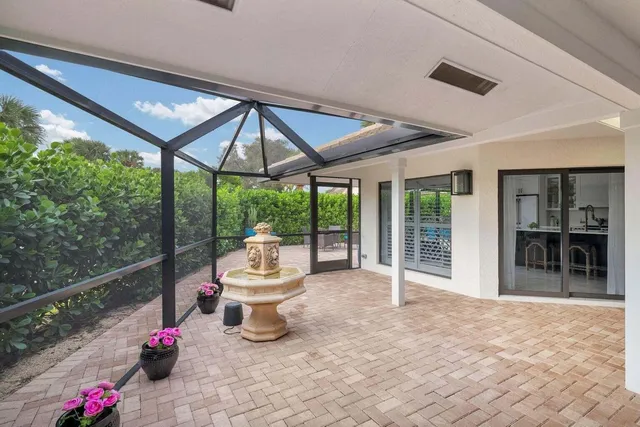 a room with furniture and a large window