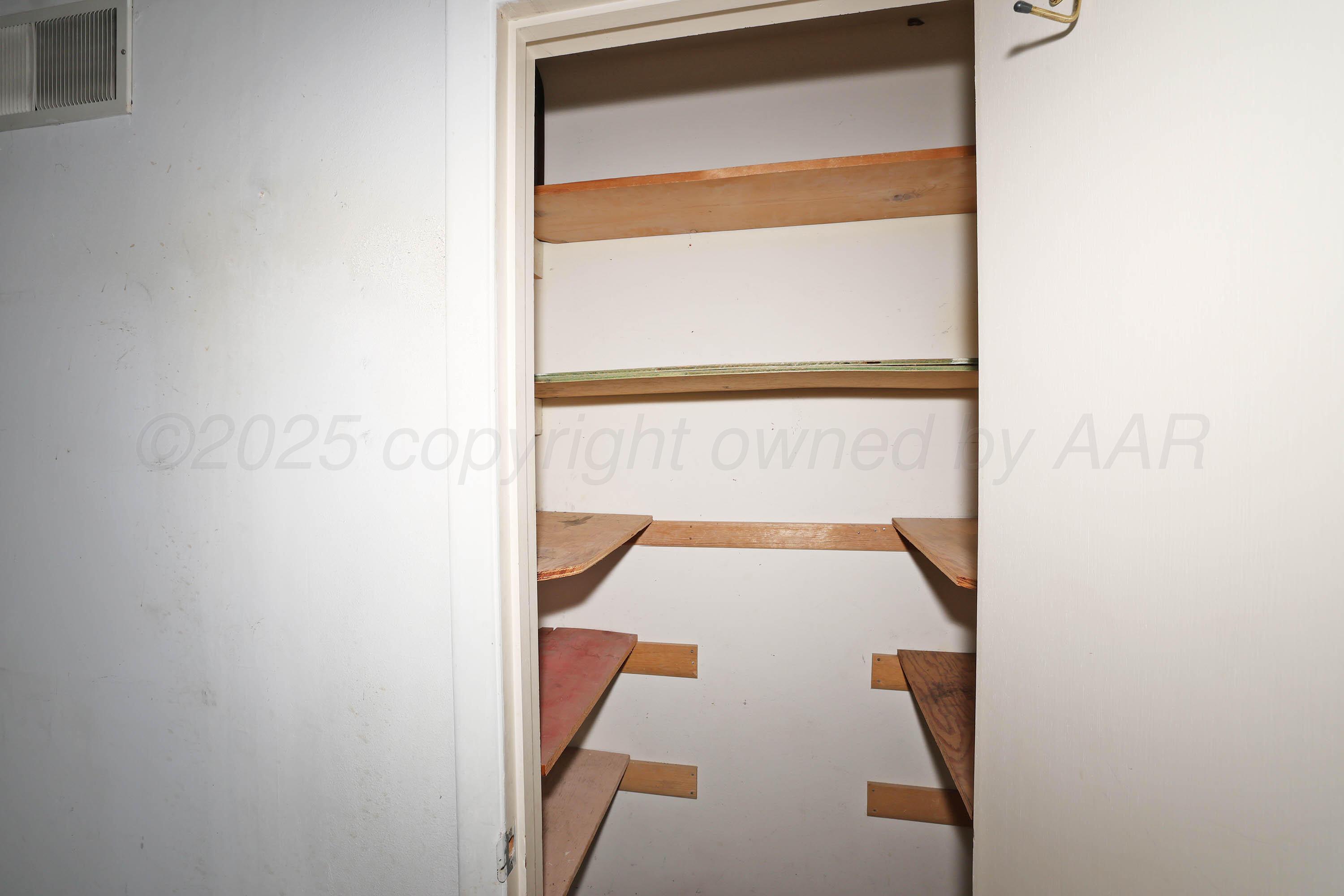 5127 Royce Drive Amarillo, TX 79110 - Photo 27 of 30 30-Garage Storage Closet