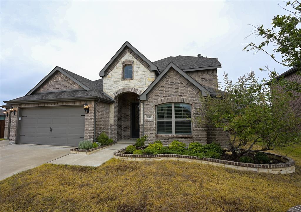 809 Deleon Drive Midlothian, TX 76065 - Photo 3 of 30 Brick and Stone with landscaped front yard