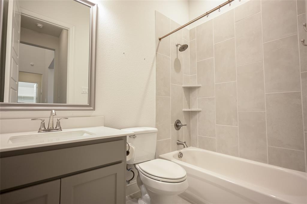 809 Deleon Drive Midlothian, TX 76065 - Photo 8 of 30 Bathroom featuring shower / washtub combination and vanity