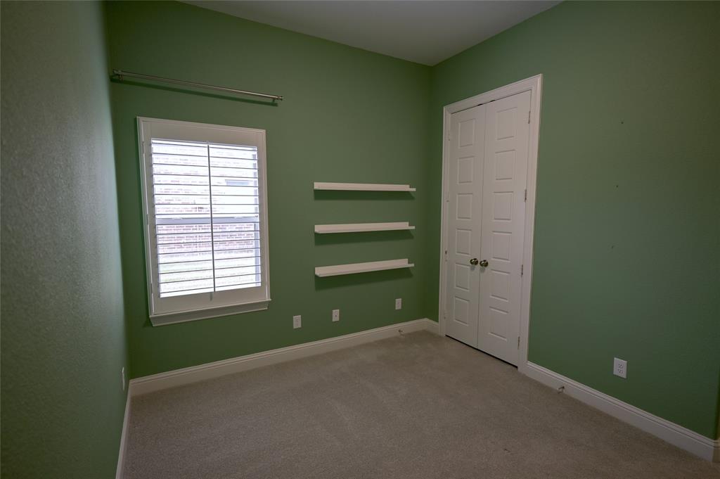 809 Deleon Drive Midlothian, TX 76065 - Photo 9 of 30 Bedroom with Walk-in closet, shelves and Plantation Shutters