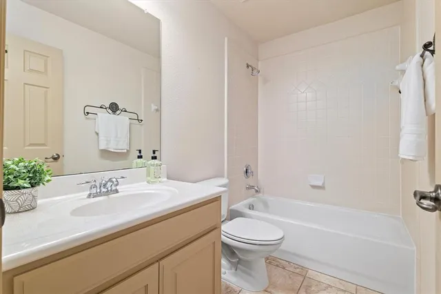 a bathroom with a sink a toilet and a bathtub