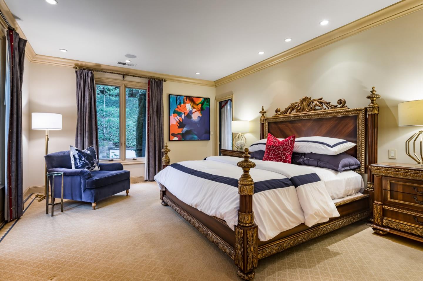 97 Ridge View Drive Atherton, CA 94027 - Photo 24 of 43 a spacious bedroom with a bed and a chandelier