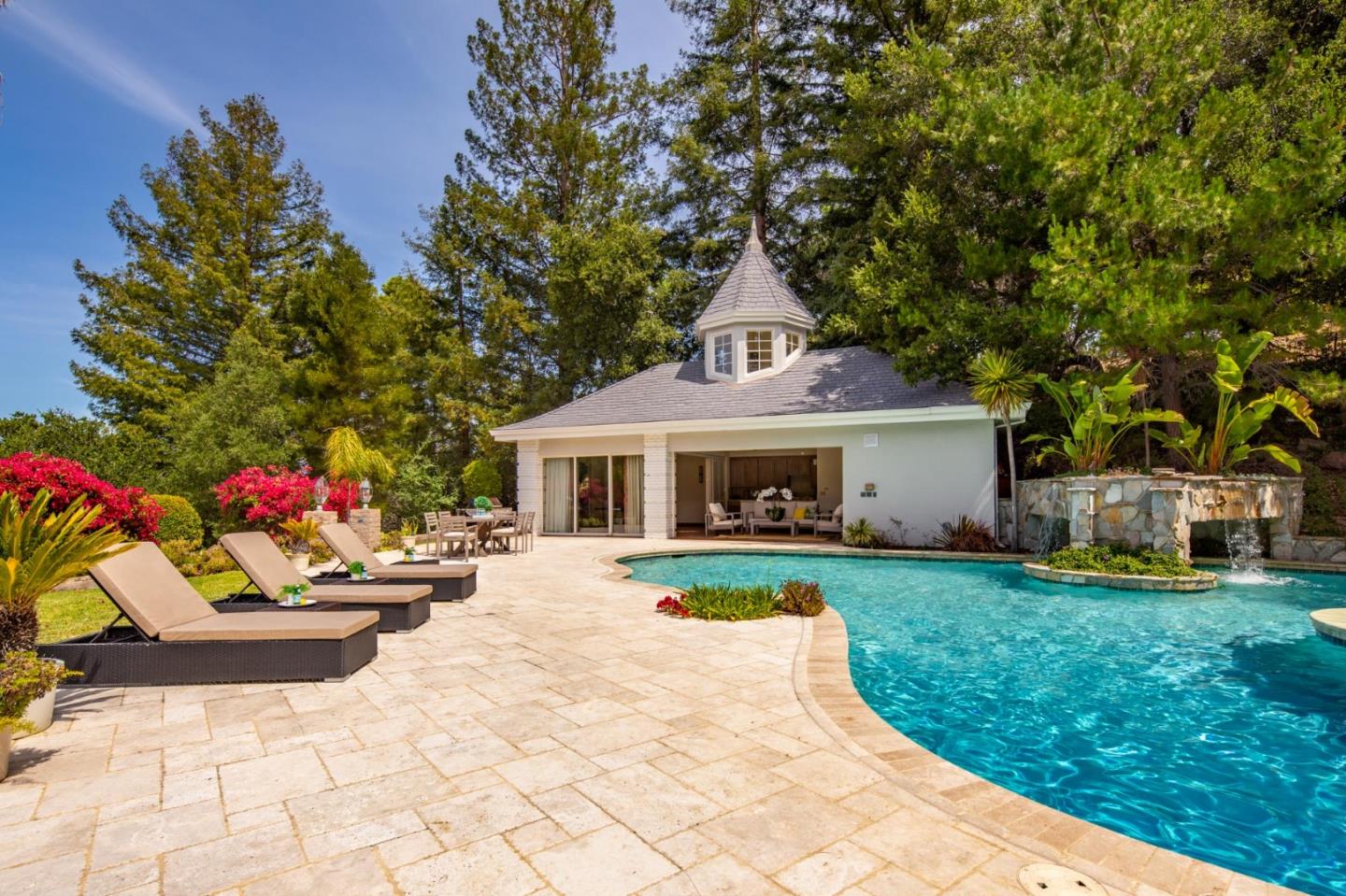 97 Ridge View Drive Atherton, CA 94027 - Photo 36 of 43 a front view of a house with a yard