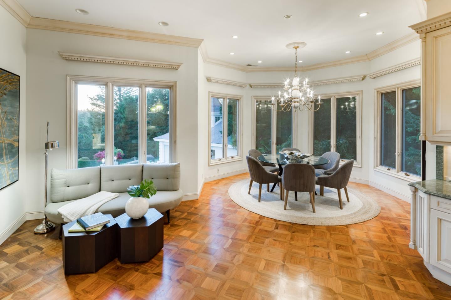 97 Ridge View Drive Atherton, CA 94027 - Photo 10 of 43 a living room with fireplace furniture and a chandelier