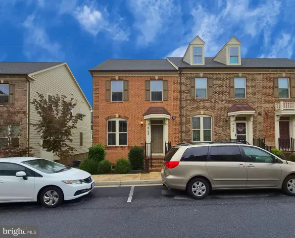 a car parked in front of a house