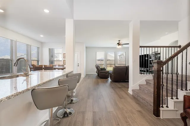 a picture of a bathroom with a sink and a mirror