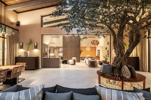 a view of a dining room with furniture window and outside view