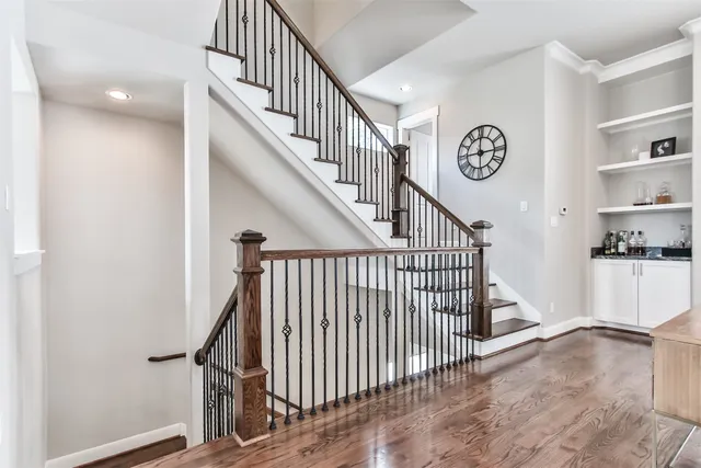 a bathroom with a sink toilet and a mirror