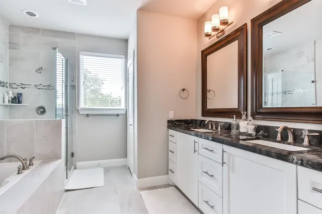 a bathroom with mirror and