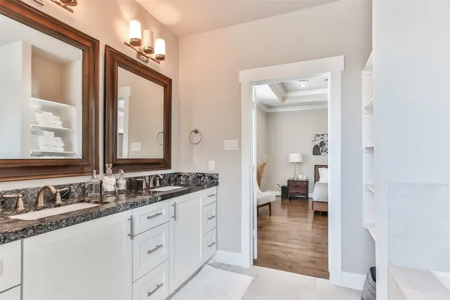 a bathroom with a bathtub and shower