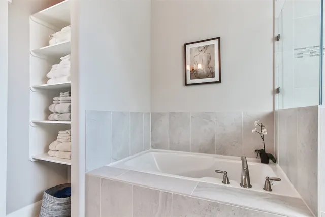 a bathroom with a sink and a bathtub