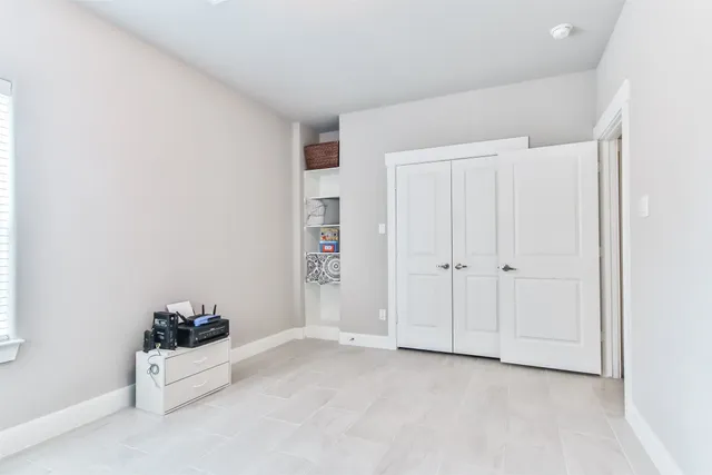 a bathroom with a granite countertop sink toilet a bathtub and a shower